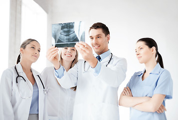 Image showing young group of doctors looking at x-ray