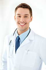 Image showing young male doctor with stethoscope in hospital