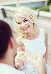 Image showing couple drinking wine in cafe