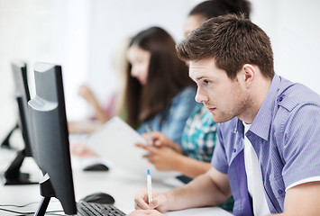 Image showing student with computer studying at school