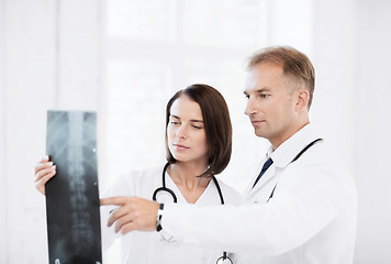 Image showing two doctors looking at x-ray