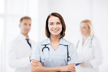 Image showing young female doctor with stethoscope