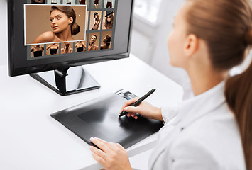 Image showing female retoucher working at home or office