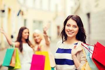 Image showing girls with shopping bags in city