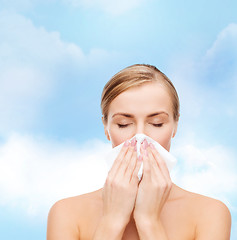 Image showing beautiful woman with paper tissue