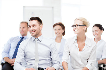 Image showing businessmen and businesswomen on conference