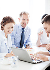 Image showing businessman with team on meeting in office