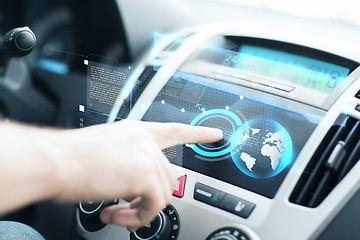 Image showing man using car control panel