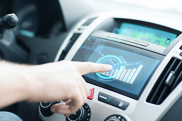 Image showing man using car control panel