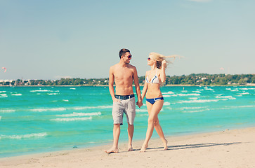 Image showing couple walking on the beach