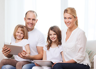 Image showing family and two kids with tablet pc computers