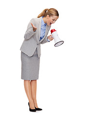 Image showing angry businesswoman with megaphone