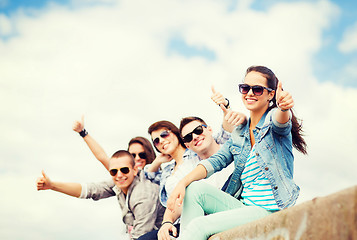 Image showing teenagers showing thumbs up