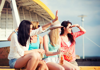 Image showing girls with drinks on the beach