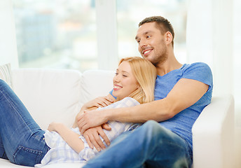 Image showing smiling happy couple at home