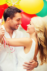 Image showing couple with colorful balloons