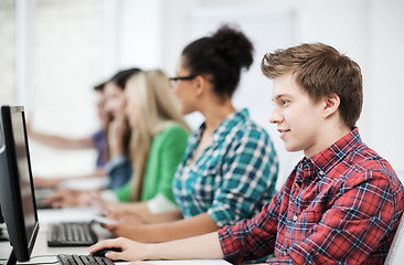 Image showing student with computer studying at school