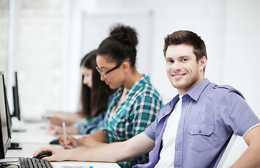 Image showing student with computer studying at school