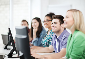 Image showing students with computers studying at school