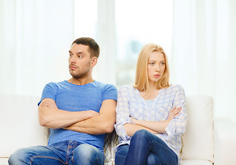 Image showing unhappy couple having argument at home