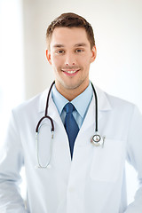 Image showing young male doctor with stethoscope in hospital