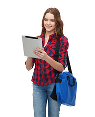 Image showing smiling student with tablet pc and bag