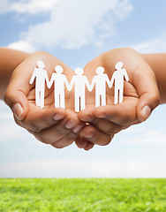 Image showing womans hands with paper team