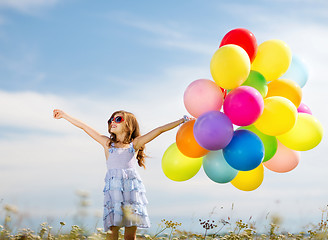 Image showing happy girl with colorful balloons