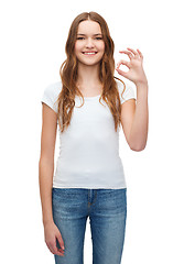 Image showing woman in blank white t-shirt showing ok gesture