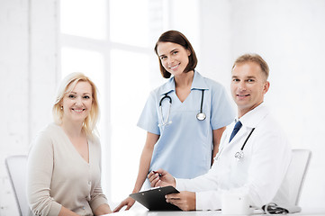 Image showing doctor and nurse with patient in hospital