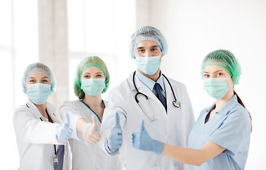 Image showing group of doctors in operating room