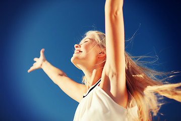 Image showing beautiful woman enjoying summer outdoors