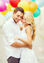 Image showing couple with colorful balloons