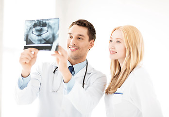 Image showing two doctors looking at x-ray