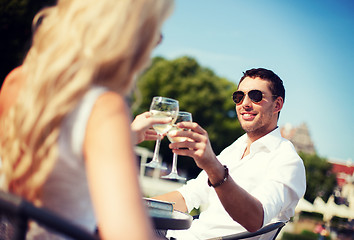 Image showing couple drinking wine in cafe