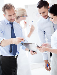 Image showing business team having discussion in office