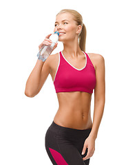 Image showing smiling woman with bottle of water