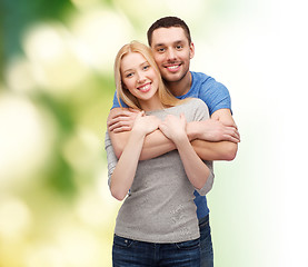 Image showing smiling couple hugging