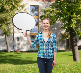 Image showing smiling young woman with blank text bubble