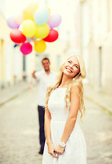 Image showing couple with colorful balloons