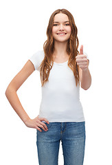 Image showing smiling teenager in blank white t-shirt