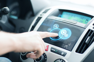 Image showing man using car control panel