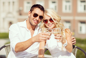 Image showing couple drinking wine in cafe