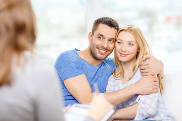 Image showing young couple hugging at psychologist office