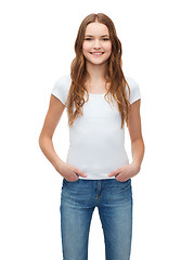 Image showing smiling teenager in blank white t-shirt