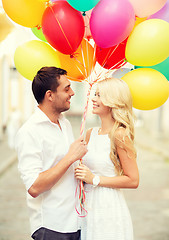 Image showing couple with colorful balloons