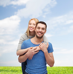 Image showing smiling couple hugging