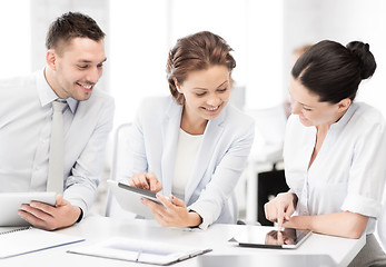 Image showing business team working with tablet pcs in office