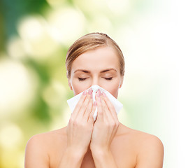 Image showing beautiful woman with paper tissue