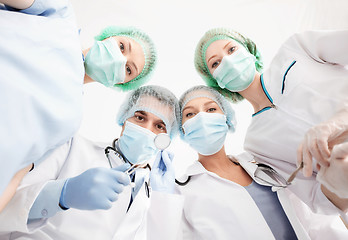 Image showing group of doctors in operating room